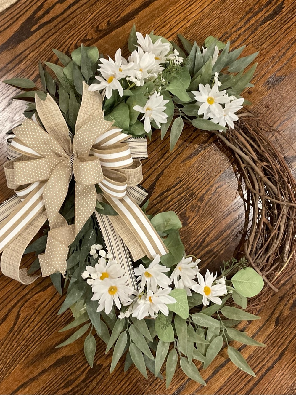 White Daisy and Greenery Grapevine Wreath with Beige Ribbon Accent